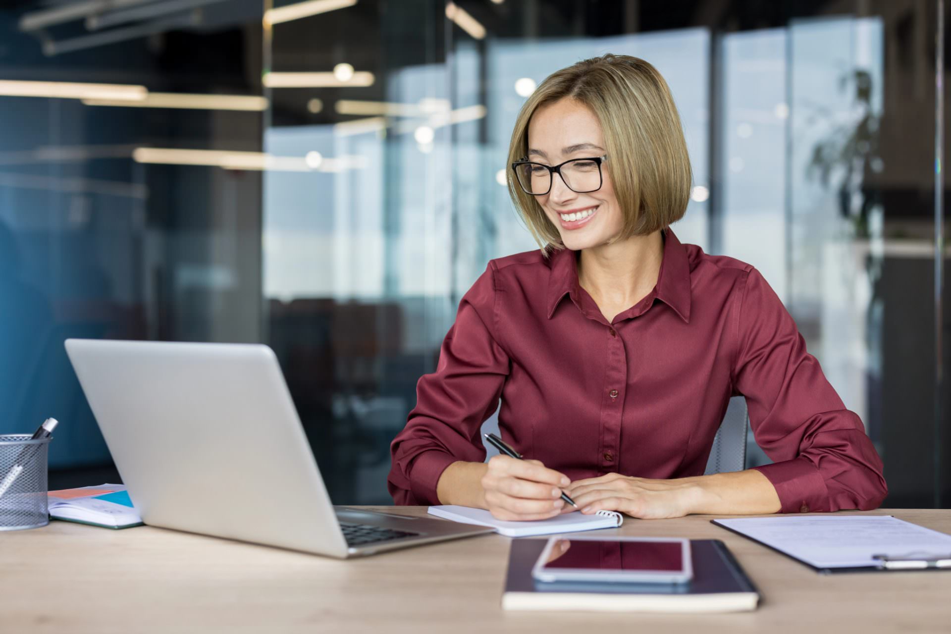 woman at computer learning Skill Adjacency for Administrative Professionals
